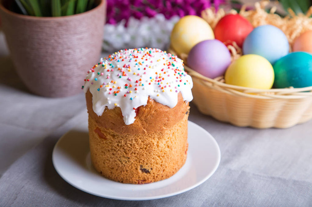 Easter. Traditional Russian and Ukrainian Easter cake (kulich) and painted eggs. Close-up, selective focus. - Fotó, kép