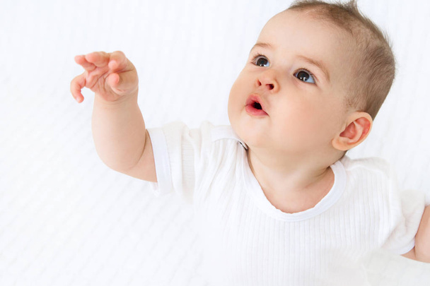 Beautiful cute baby on white background - 写真・画像