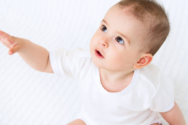 Beautiful cute baby on white background - Foto, afbeelding