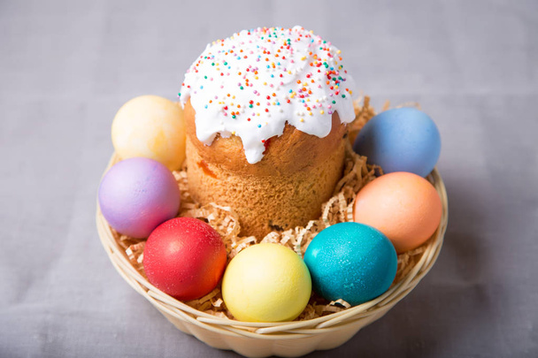 Easter. Traditional Russian and Ukrainian Easter cake (kulich) and painted eggs. Close-up, selective focus. - Zdjęcie, obraz