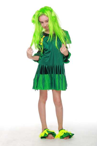 Happy girl in fancy dress is green and green hair - Foto, Imagen