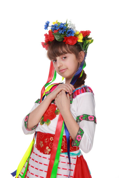 Girl in flowers wreath and traditional clothes - Fotoğraf, Görsel