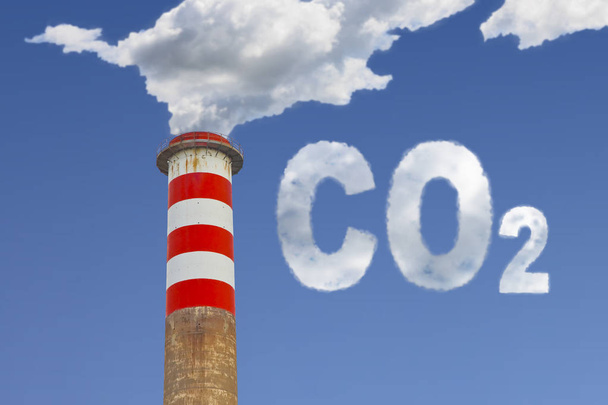 Высокобетонный дымоход излучает CO2 в атмосферу - концептуальное изображение
 - Фото, изображение
