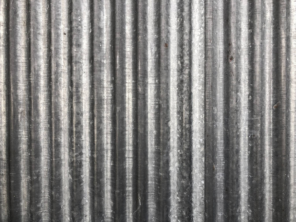 Zinc Pattern beside wallpaper and background with a litter rusty on it. - Photo, Image