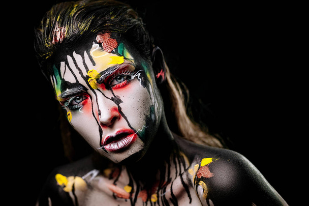 art makeup. girl with a multi-colored make-up, image for halloween - Foto, immagini