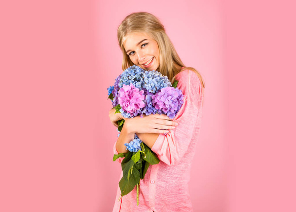 Summer beauty. Fashion portrait of woman. Healthy hair and skin. Makeup cosmetics and skincare. Spring woman with hydrangea flowers. girl with summer makeup. thank you - 写真・画像