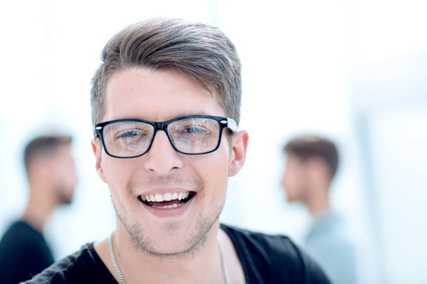 Close up portrait of a handsome guy with a smile on his face - Zdjęcie, obraz