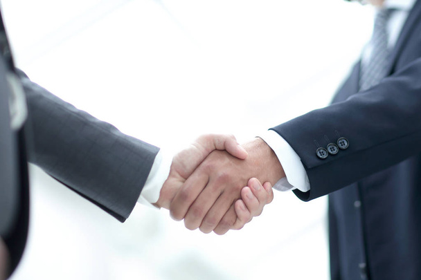 Close up image of business handshake at meeting. - 写真・画像