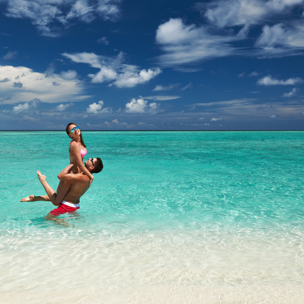 Couple on a beach at Maldives - Fotoğraf, Görsel