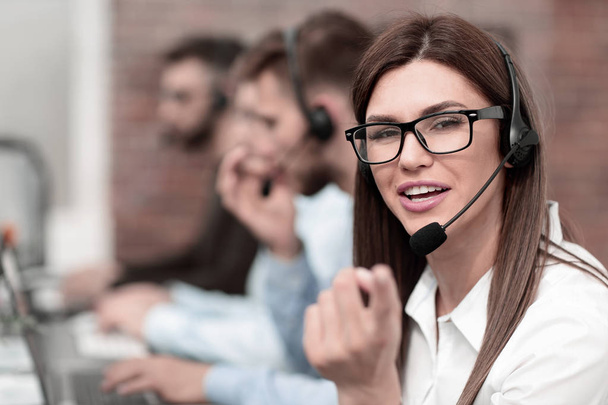 female call center operator pointing at you. the concept of choice - Foto, imagen