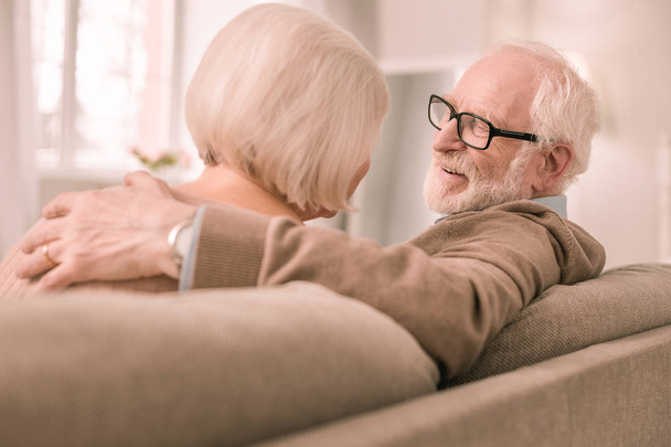 Kind bearded pensioner talking to his partner - Valokuva, kuva