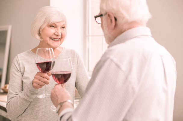 Amazing retired woman smiling to her partner - Zdjęcie, obraz