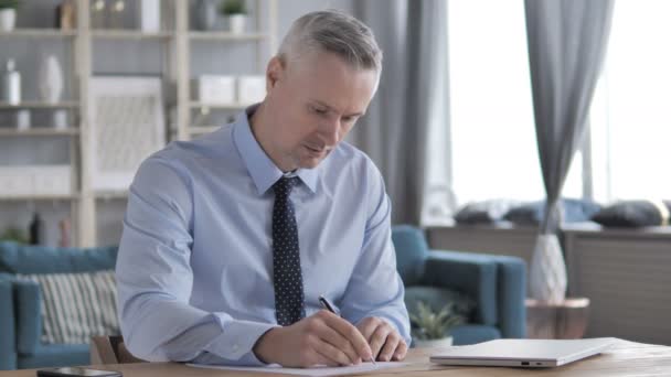 Gray Hair Businessman Writing a Letter - Footage, Video