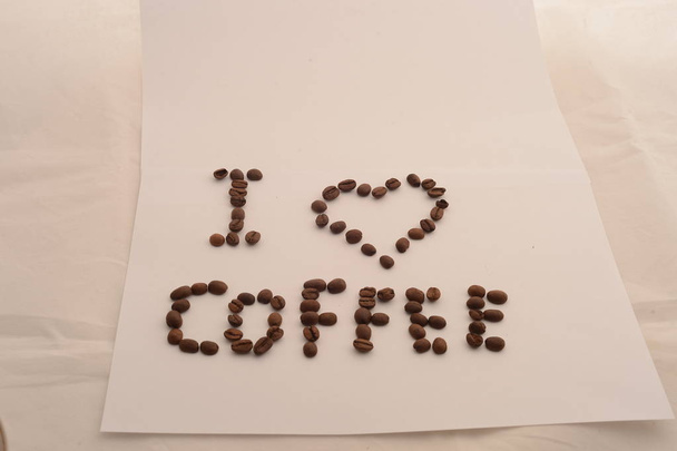 lettering I love coffee from coffee beans on white background - Photo, image