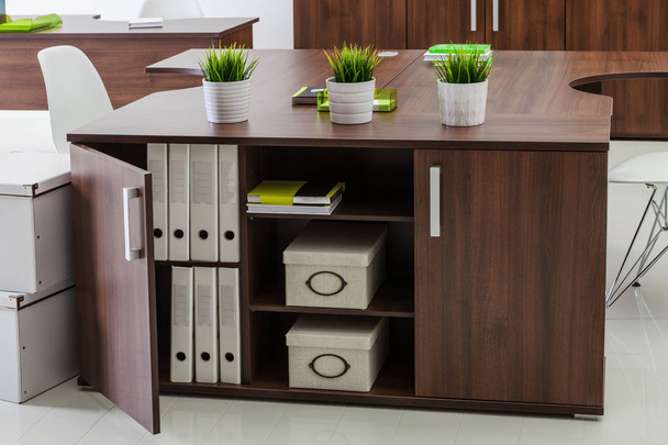 wooden tables and plants in a modern office - Zdjęcie, obraz