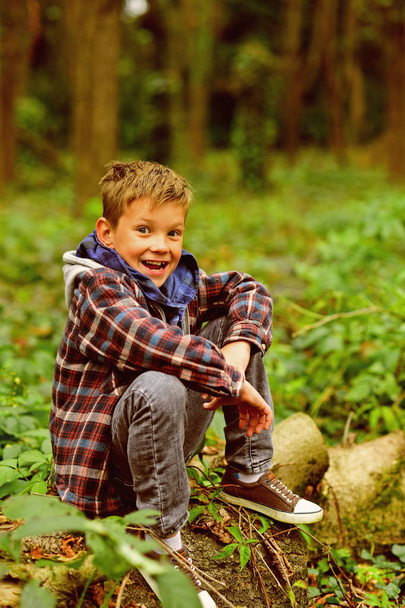 Inspiring others to be happy. Happy kid. Small kid happy smiling in woods. Small child play in forest. Pure joy of life - Photo, Image