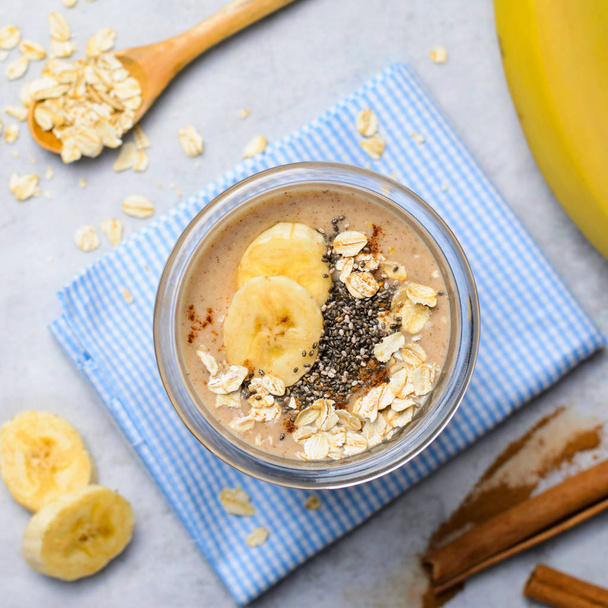 Banana Cinnamon Smoothie with Oats and Chia Seeds, Healthy Vegan Drink - Photo, Image