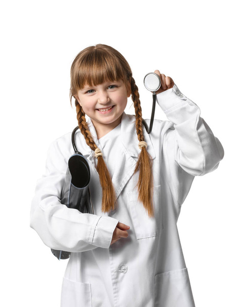 Portrait of cute little doctor on white background - Foto, Imagen