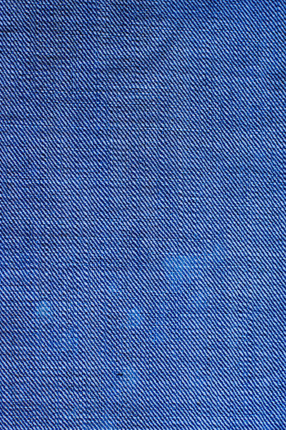 ジャン ・ ファッション生地クローズ アップ。デニムの背景。古いグランジ ビンテージ テクスチャ繊維。青い色 - 写真・画像