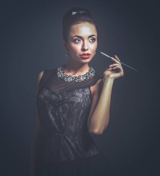 Portrait of young beautiful woman with jewelry - Foto, Bild