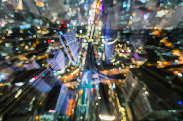 Vue de dessus flou bokeh lumière ville centre-ville sur le mouvement de la voie ferrée mouvement, fond abstrait
 - Photo, image