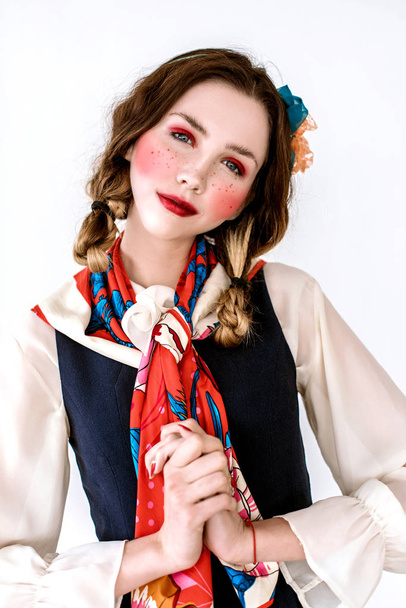Portrait of beautiful woman posing in colorful cravat and red shades makeup  - Foto, Imagem
