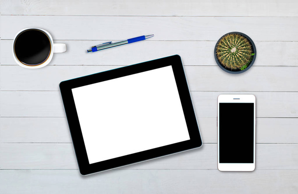 notebook per smartphone tablet vista dall'alto su legno di sfondo
 - Foto, immagini