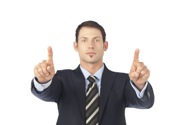 attractive businessman pointing his finger in front - Foto, Imagen