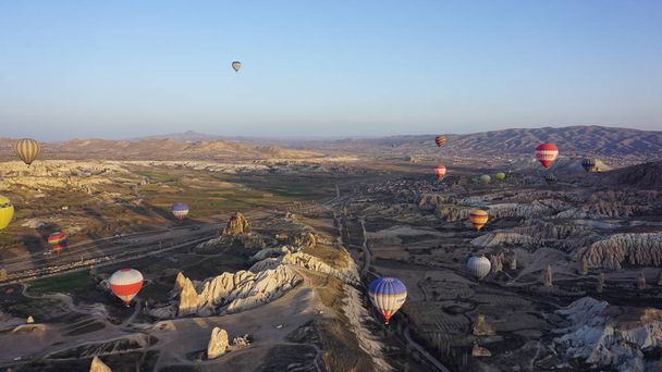 To travel by a balloon at a sunrise in Cappadocia - Fotó, kép