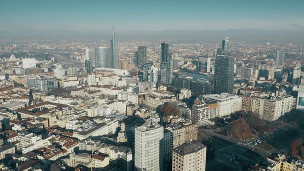 MILAN, ITALY - JANUARY 5, 2019. Aerial shot of the Porta Nuova business district skyscrapers within cityscape - Foto, Imagen