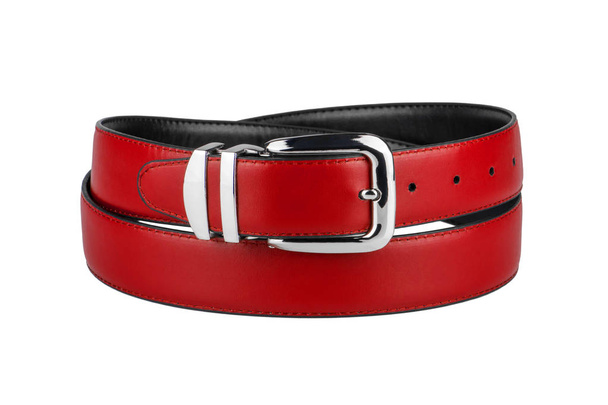Fastened fashionable men's red leather belt with shiny chrome metal buckle isolated on white background - Fotó, kép