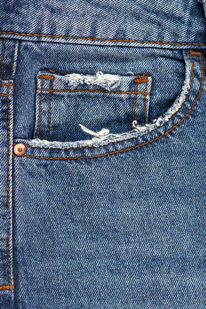 Closeup of blue shabby Jeans detail. denim background. - Photo, Image