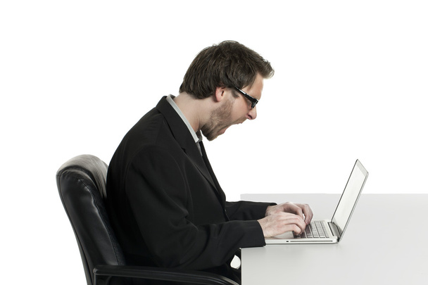 a yelling businessman on his laptop - Photo, Image