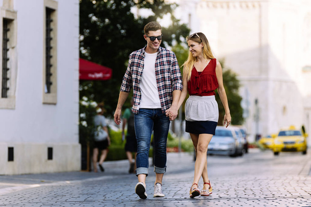 Romantic Young Couple Walking in the City. Relationship concept. - Fotó, kép
