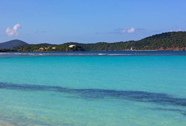 The azure waters of the Caribbean Sea near the island of St. Thomas, USVI. The tropical climate and sandy beaches make the island an ideal place for a winter holiday. - Fotó, kép