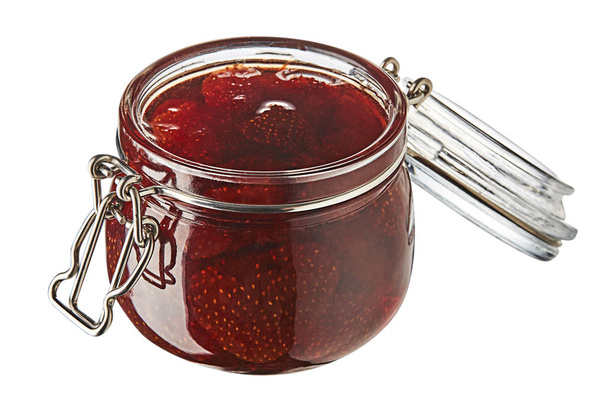 Strawberry jam in glass jar isolated isolated on white background.  - Valokuva, kuva