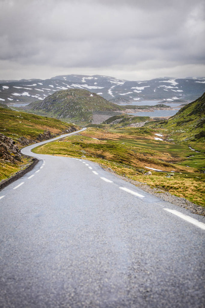 Lysevegen road running through summer norwegian mountains, located in Rogaland county. Beautiful landscape. Travel and tourism. - Фото, изображение