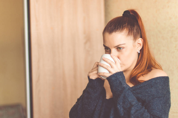Young woman enjoying morning coffee  - Zdjęcie, obraz