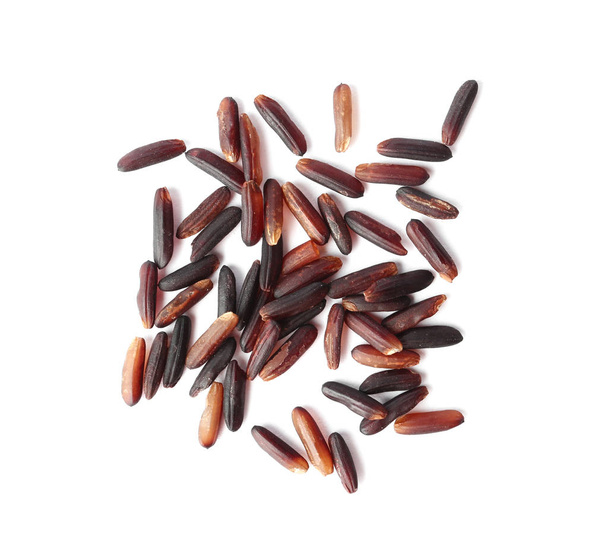 Uncooked black rice on white background, top view - Fotoğraf, Görsel