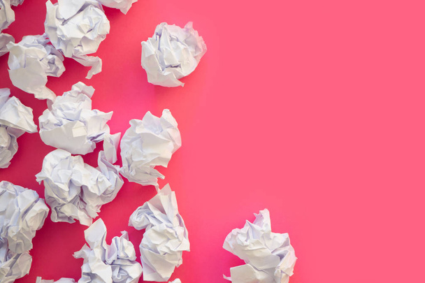 Pile of crumpled paper on a colored background. - Foto, Imagen