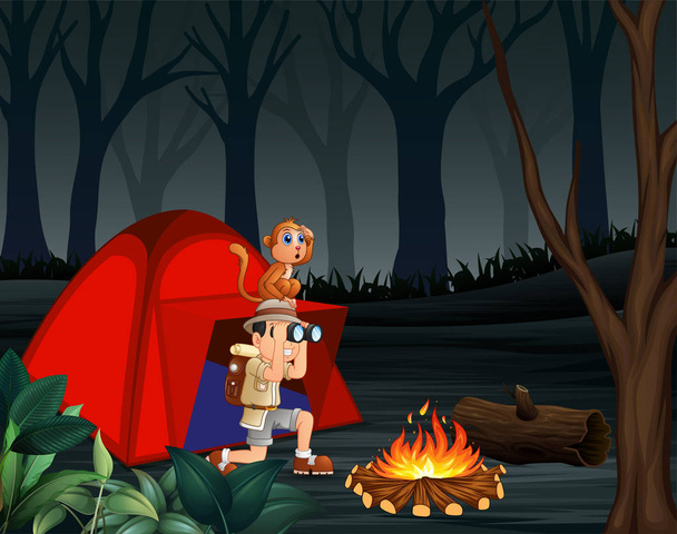 Eläintarhapoika ja hänen apinansa telttailevat pimeässä metsässä.
 - Vektori, kuva