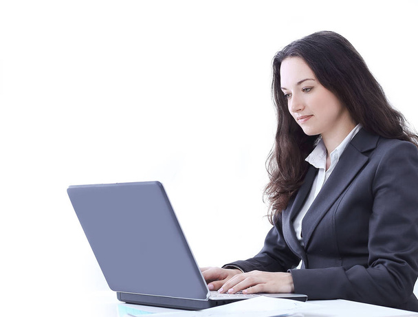 side view.business woman typing on a laptop. - Foto, Imagem