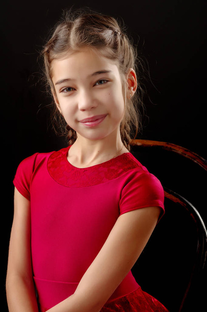 Little girl on a black background - Fotografie, Obrázek
