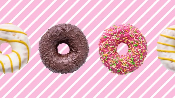 Donuts bunte Animation auf rosa weiß gestreiftem Hintergrund - Filmmaterial, Video