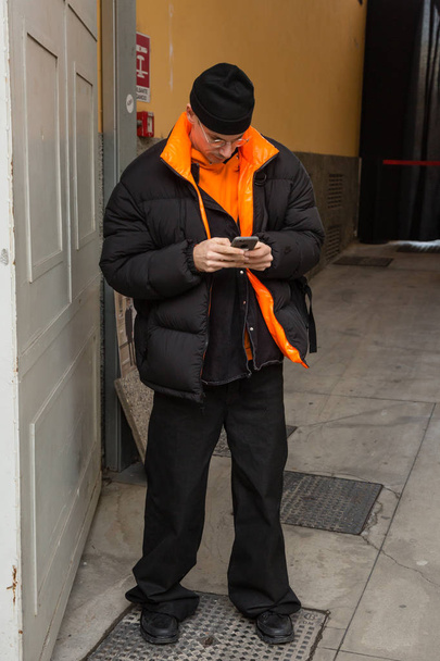 MILAN, ITALY - JANUARY 12: Fashionable man poses outside Magliano fashion show during Milan Men's Fashion Week on JANUARY 12, 2019 in Milan. - Fotoğraf, Görsel