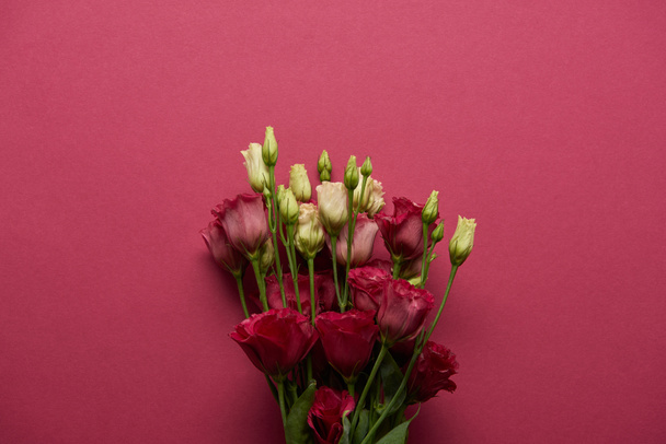 bouquet of white and pink flowers on ruby background  - Zdjęcie, obraz