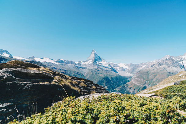 Beautiful mountain landscape with views of the Matterhorn peak in Zermatt, Switzerland. - Фото, зображення
