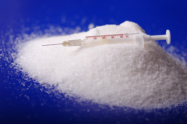 Insulin injection white a pile of sugar - Photo, Image