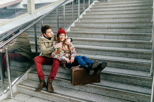 romantic couple in love sitting on stairs - Foto, Bild