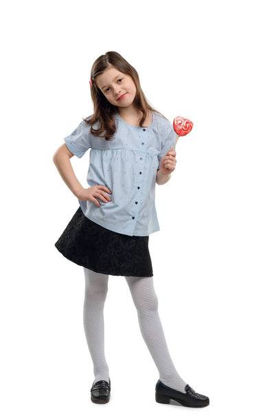 Little school girl with lollipop - Фото, зображення